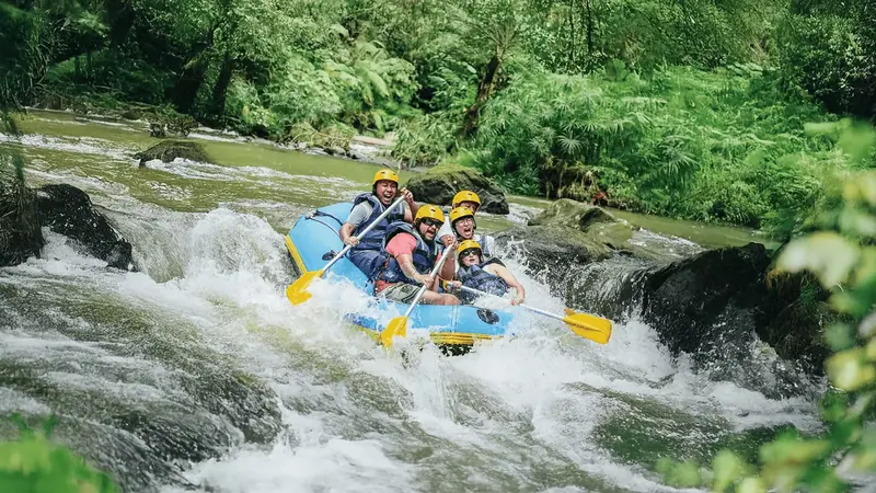 Rafting guests on the river at Pertiwi Adventure