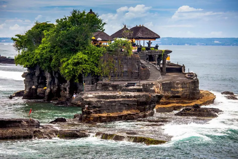 Tanah Lot sea temple beside the ocean in Bali